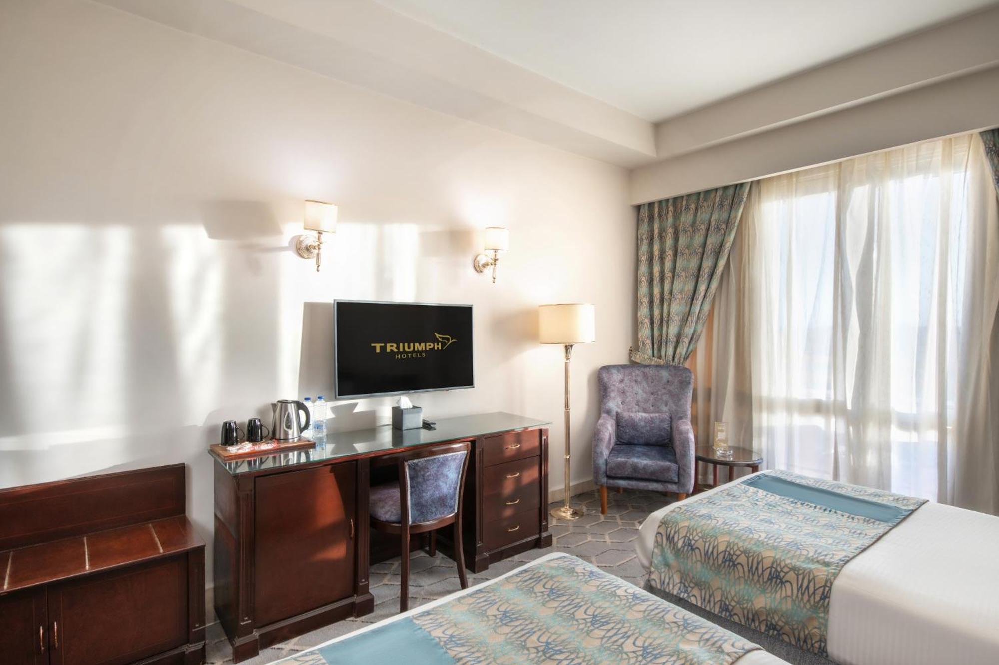 Triumph Plaza Hotel Kairo Zimmer foto